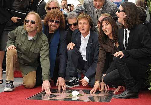 Tom Petty and Jeff Lynne with Paul McCartney Eric Idle and Olivia and