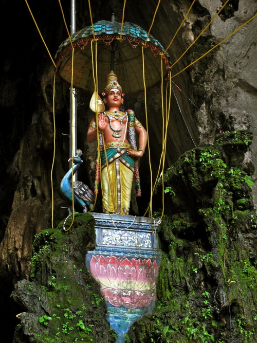 One of the many colorful Hindu statues in Batu Caves.  April 2010