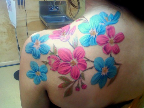 This is my first tattoo, there's a flower for each of my immediate family 