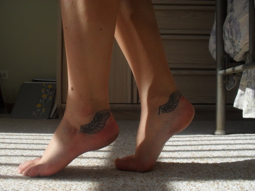 This is my second tattoo If you can't tell they are hermes wings
