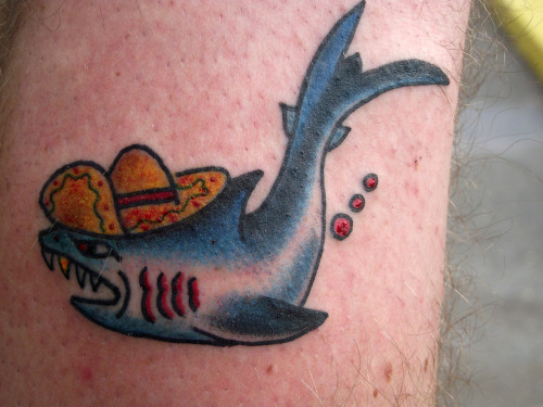 shark bite tattoo. shark attack.