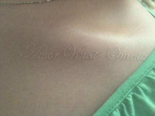 i believe in Amor Vincit Omnia, it means Love Conquers All.