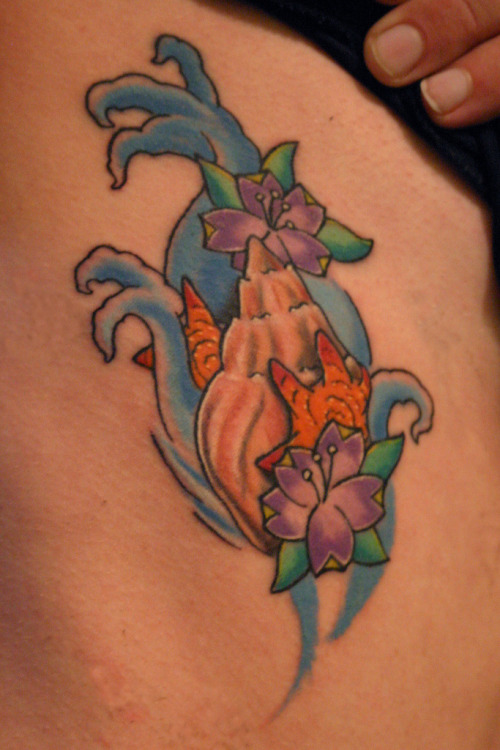 shell tattoo. conch shell tattoo by