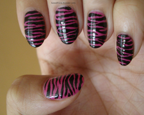 Inspiration
nailcrazy:

Black and pink zebra print :)A little messy, but it’s okay, this picture doesn’t do them justice aha