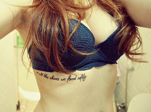 tattoo chest boobs quote text