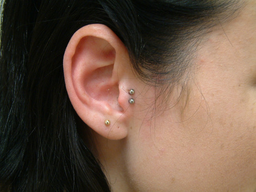 Double Tragus Piercings by jessicarose88 on flickr (click)