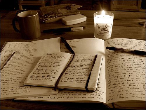tumblr_l1m5i2C1ZX1qbhteeo1_500_large.jpg (books,candle,pen,writings,desk)