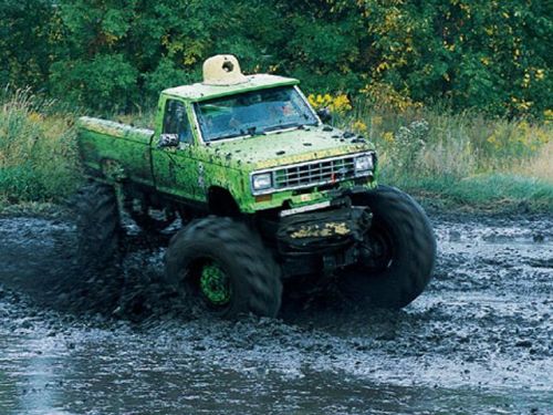 jacked up trucks. jacked up truck mudding mud