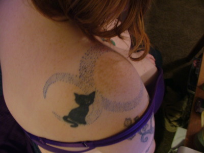 My moons and black cat tattoos. I started the moons at the beginning of 