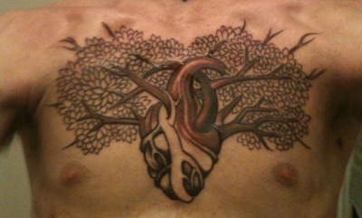 This was my first tattoo after the first session.  I thought the halfway version was very interesting since you can see all the single leaves and the intricate details.  Now that it’s filled in the intricacies are less obvious.  I love my tattoo a lot the way it is now but it’s very cool to see the progression it went through. Done by Nathan Kostechko at Coil Tattoo in LA http://thestaticsilence.tumblr.com/