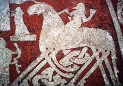 Detail of Odin riding Sleipnir from the Tjängvide image stone, Viking culture of Sweden, c. 700-1100 CE, Swedish Museum of National Antiquities, Stockholm 
Before Scandinavia was Christianized, Odin reigned supreme as the chief god of the Norse Pantheon, associated with war, wisdom, death and poetry. On Yule, a pagan winter solstice celebration, Odin would lead a wild hunt through the sky while riding his eight-legged horse, Sleipnir. It is said that children would place their shoes near the chimney filled with carrots, straw or sugar for Sleipnir to eat. In the morning, they would find that Odin had replaced the food with gifts or candy, a reward for the childrens&#8217; kindness.
Sound familiar? Like the modern tradition of leaving food and drink for Santa and his flying reindeer on Christmas, and waking up in the morning to find stockings filled with gifts? It is possible that through the years the god Odin became Saint Nicholas, Sleipnir became a team of reindeer, and ancient germanic pagan practices live on when we hang stockings by the fireplace on Christmas Eve, waiting them to be filled as a reward for our kindness.
