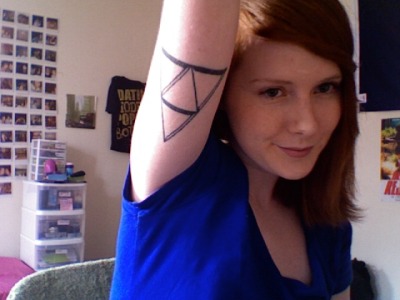 My triforce/sierpinski triangle tattoo. Done at a shop in Portland, ME that