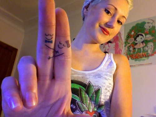My hugging finger tattoos. They desperately need touching up, 