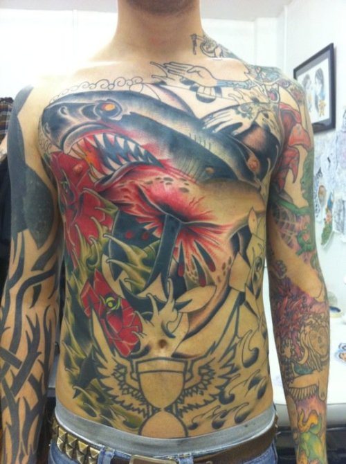 Shark chest tattoo by Sam Ricketts Shark chest tattoo by Sam Ricketts