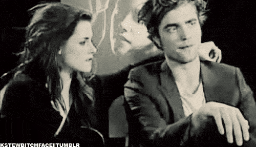 I love the way she looks at him while biting her lips. HOT!