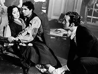 Feb. 5, 2011<br /><br />31. Wuthering Heights (1939)<br /><br />Starring Merle Oberon, Laurence Olivier, David Niven, Flora Robson, Donald Crisp, Geraldine Fitzgerald, Hugh Williams, Leo G. Carroll<br /><br />Directed by William Wyler<br /><br />Plot: &#8220;The story of unfortunate lovers Heathcliff and Cathy who, despite a deep affection for one another, are forced by circumstance and prejudice to live their apart…&#8221; (from IMDb)<br /><br />Can I just say that I hated this movie? I know it&#8217;s a classic and all that, but I really don&#8217;t see what&#8217;s so wonderful. It&#8217;s supposed to be a great love story but what I see from this adaption is two selfish, shallow, demented people so consumed with lust that it ruins their lives. I&#8217;m sorry, but that is not romance. I really did not care at all for either character&#8212;Heathcliff or Cathy. So, I apologize for those that love this movie, I was really just waiting for it to end. 
