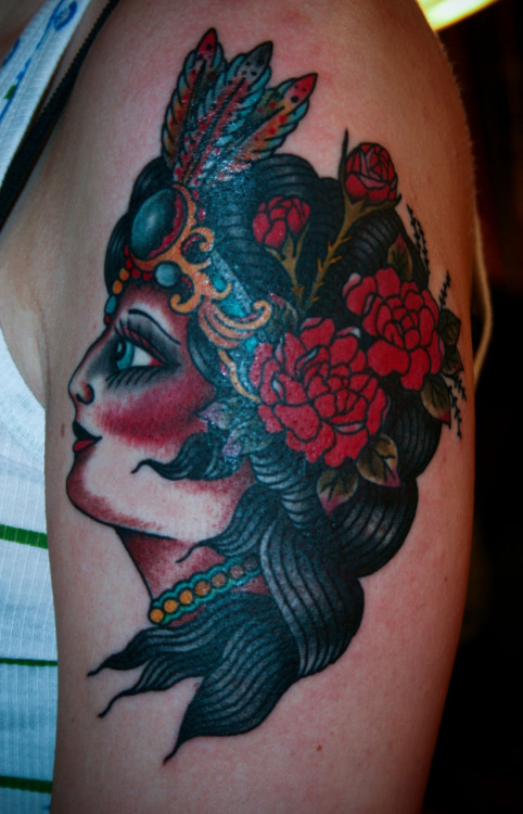 I recently tattooed this gypsy lady with two french type roses in her hair