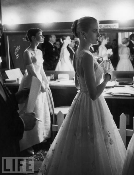 life:  The two most elegant stars of their era, Audrey Hepburn and Grace Kelly, are photographed backstage at the RKO Pantages Theatre in 1956 as they wait to present: Hepburn gave Best Picture to Marty, and Kelly awarded the Best Actor statue to Ernest Borgnine for the same film. LIFE’s Best Oscar Photos