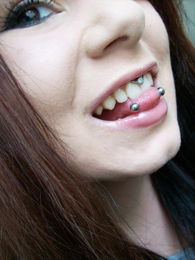 horizontal piercing tongue. Smiley piercing + horizontal