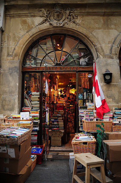 bookoasis:

The Abbey Bookshop in Paris is a source for English-language books and is owned by a Canadian (hence the Canadian flag). The building is an eighteenth century Rococo townhouse in the heart of Paris. 
