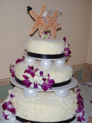 Beach wedding cakes can be a traditional three layered cake with icing