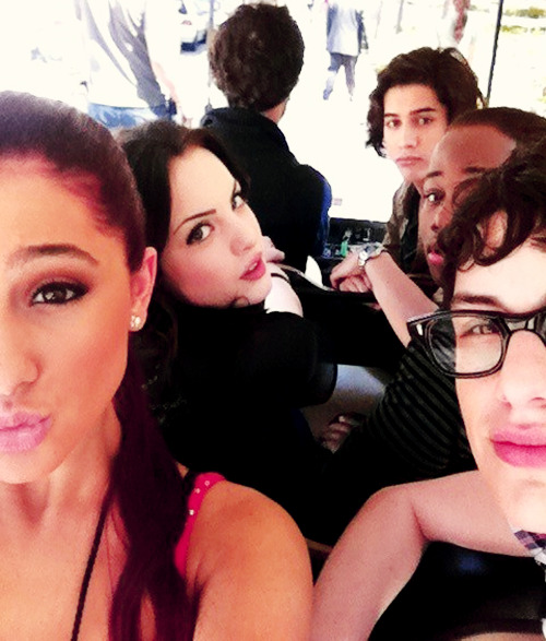 ariana grande and avan jogia woman in ripped shirt