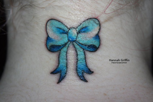 bow tattoo on back of neck. ow tattoo on ack of neck. ow
