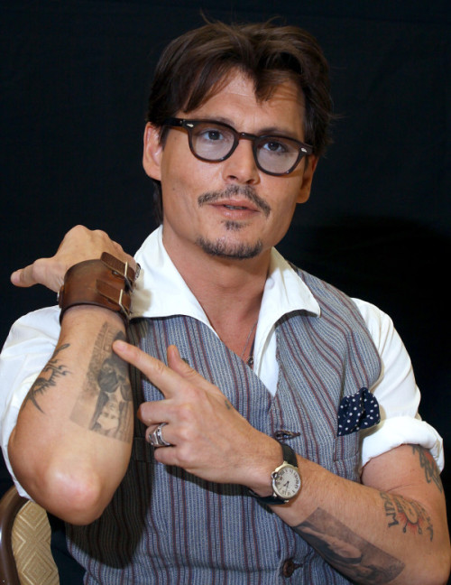 johnny depp tattoos 2011. tagged Johnny Depp tattoo 2011