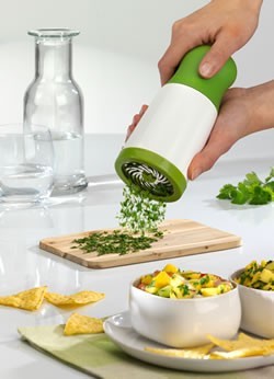 I WANT THIS! It is a microplane herb mill. Purpose is to prep your herbs easily and without bruising or blemishing the fragile leaves. #imacookingfreaksorry