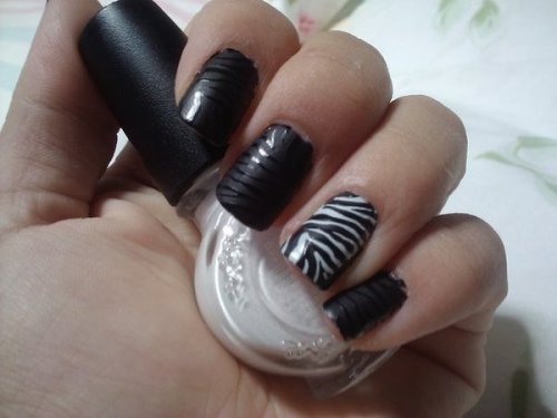 how to do animal print nails. on black zebra print nails