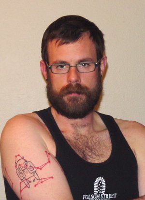 Hot ass bear with a Radiohead tattoo I neeeed this