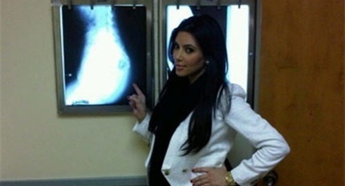 Yes we have yet another interruption&#8230;SMH&#8230;ITS A SAD DAY WHEN America’s sweetheart Kim Kardashian has announced that she has received the terrifying news that she has been diagnosed with malignant ass cancer. As you can see in the photo above Kim Kardashian bravely points out the large tumorous mass on the x-ray of her ass. Doctors have told Kim, that though it is one of the largest malignant ass tumors they have encounter, it is not inoperable and they have given Kim good odds of coming through the operation cancer free. However, Kim has rejected treatment and flatly refused to consider getting her ass tumor removed. Apparently Kim feels life just isn’t worth living if she does not have an abnormally huge ass. Kim’s sister Khloe summed up her sister’s opinion, “Can you imagine Kim Kardashian being able to eat at ‘Waffle House’ without armed guards keeping the patrons at bay? Kim doesn’t want to live in a world like that, and I wouldn’t either!” With her ass cancer going untreated doctors give Kim just 3 months to live.