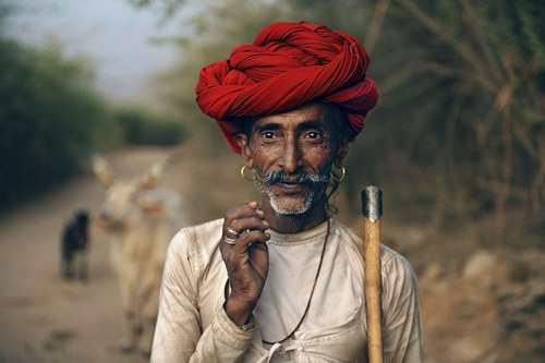 A Rabari herdsman, Rajasthan, India, 2008. Photograph: Steve McCurry “Some photographers can make a great portrait of someone looking away  from the camera,” Steve McCurry says, “but, for me, it all comes down to  the eyes. I always want my subjects to be looking directly into my  lens. That has become a kind of style, I guess; a way of shooting and  a way of seeing.”  Photograph: © Steve McCurry/Magnum