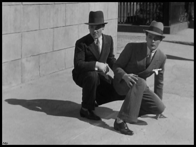 &amp;#10;James Cagney and Edward Woods are stylish on the sidewalk………The Public Enemy (1931)&amp;#10;