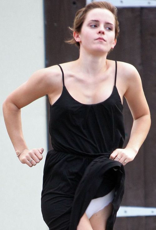 I dont know what Emma Watson was doing here but obviously her dress blew up just in time for Malfunction Monday