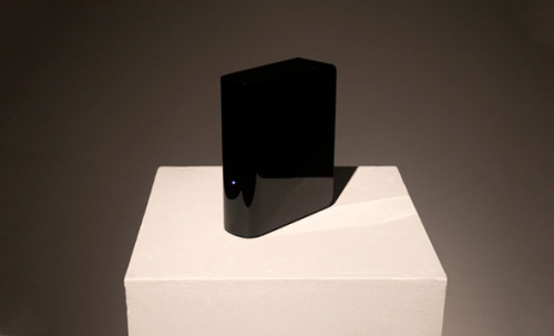 How to download 5 million dollars worth of music and get away with it as a genius.

5 Million Dollars 1 Terrabyte (2011) is a sculpture consisting of a 1 TB Black External Hard Drive containing $5,000,000 worth of illegally downloaded files. A full list of the files with clickable download links here.

Awesome. | via
