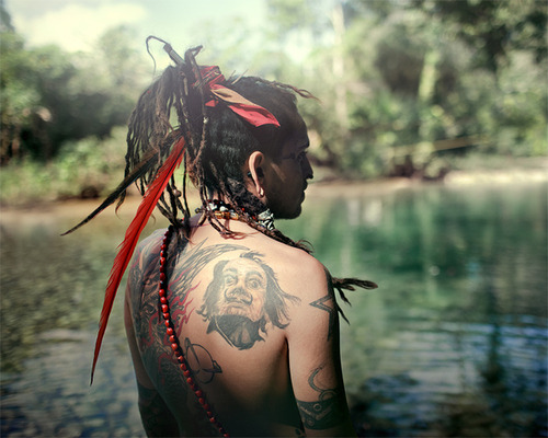 tags shaman dreads water woods trees Hair gauges tattoos backs men feathers