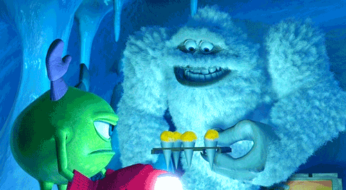 A cartoon shows a white, fuzzy yeti offering a plate of yellow snow cones to a green, round, one-eyed "monster"