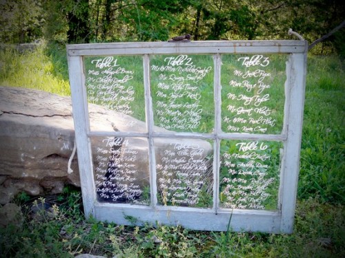Repurpose an old window for your wedding seating chart
