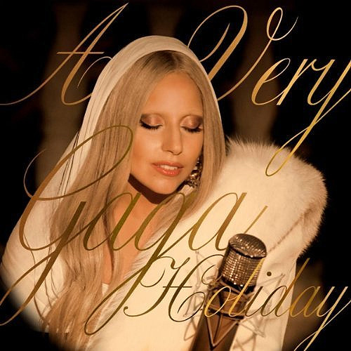 diaryofg:

New EP coming out next week called “A Very Gaga Holiday”Gaga already told us she want to release a little Chirstmas album.The album is coming out next week but you can already listen to the songs. 
Tracks:
White Christmas
Orange Colored Sky
Yoü And I
The Edge Of Glory
