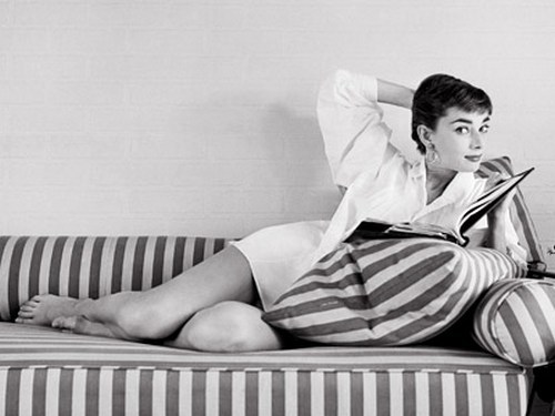 Audrey Hepburn studies her