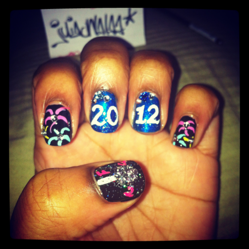 Just some new years 2012 nail art :) I was rushing so it's not my best but i
