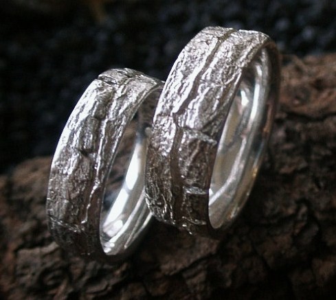 Our Tree Line Wedding Bands carry the intricate surface patterns of tree