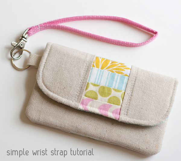 Make a simple wrist strap. ($ pattern for wallet here)