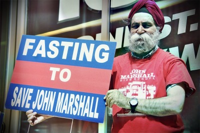 FAST ACTION &#8212; Activist and West Park, Ohio, resident Satinder P. S. Puri protests the planned demolition of John Marshall High School outside the 19 Action News studio in downtown Cleveland on April 16, 2012. Puri is calling for Mayor Frank Jackson to bar the scheduled demolition of the 80-year-old high school. He said the school is a community gem and should not be destroyed. &#8220;I will go on a hunger strike the moment they begin the demolition,&#8221; Puri said. &#8220;A hunger strike means a great injustice has been done.&#8221; Photo by Brandon Blackwell @CapturedCLE