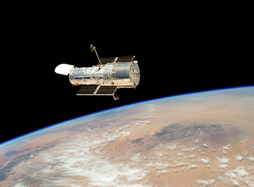 APRIL 25, 1990: Hubble Telescope Launched into SpaceTwenty-two years ago, the space shuttle Discovery placed the Hubble Telescope into a low orbit around Earth. In 2009, the Hubble telescope was in need of repairs; ones never intended to be performed in orbit. That year, NOVA presented “Hubble’s Amazing Rescue,” the unlikely story about how the world’s most beloved telescope was saved. 
Many people have gazed in awe at the Hubble Space Telescope’s photographs. But few laypeople realize just how much effort goes into preparing such images. To see how much effort goes into preparing such images, head on over to PBS.org for a NOVA scienceNow interactive feature, “How Hubble Sees.”
Image:  NASA and STScI 