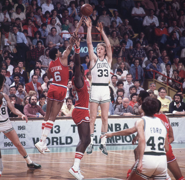 Celtics forward Larry Bird shoots over the outstretched hand of Julius Erving and Darryl Dawkins during a 1980 playoff game between the Celtics and 76ers. Philadelphia and Boston fans will see another chapter of this long rivalry unfold when the two teams meet in the second round of the playoffs. Both Boston and Philadelphia won last night to advance to the second round. (Walter Iooss, Jr./SI)   
GALLERY: Rare Photos of Larry Bird | Julius ErvingTHOMSEN: 76ers celebration was nine years in the makingMANNIX: Vintage KG helps Celtics advance past Hawks
