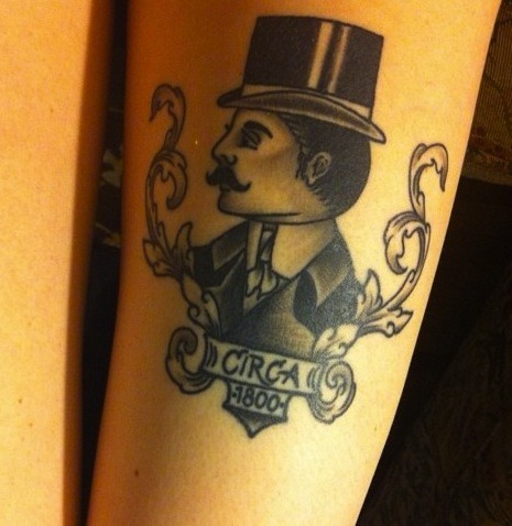 This tattoo represents my love of the 18th century Victorian London era