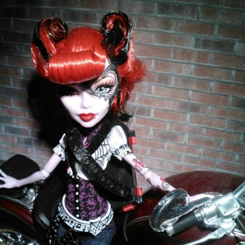 Operetta’s star always shines, but this candid shot really captures her inner sparkle. Sources close to the songstress reveal that autographed copies of this photo may be available in the Creepateria in weeks to come. 
strangelovecraft:

#Monster #High #Operetta #doll, in proper #rockabilly #scooter-trash surroundings. #Mattel #toy #toycrewbuddies #instahub #instagram #webstagram #pretty #tattoo #gorgeous #girl #motorcycle (Taken with instagram)
