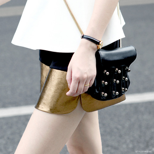 styletrove:

Gold leather spliced velvet shorts. Crazy good.
